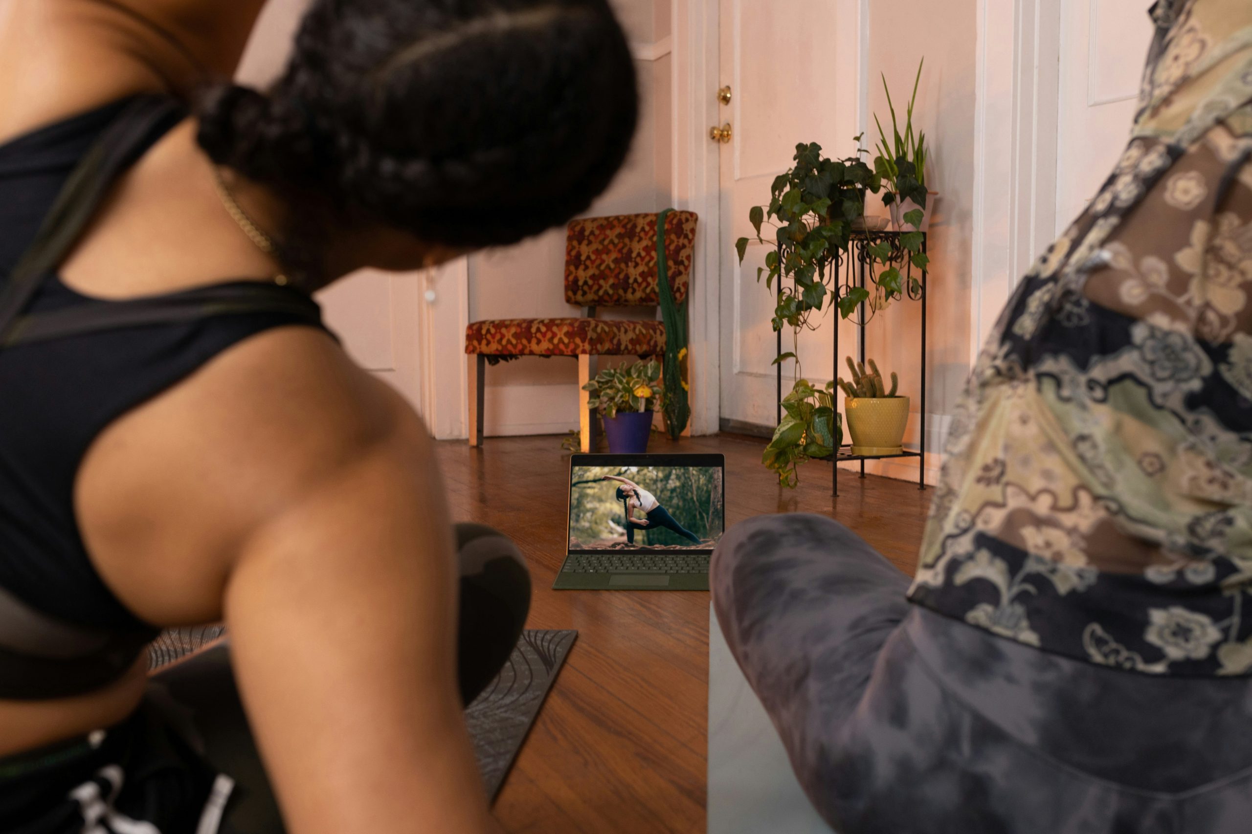 A side-by-side photo of a woman before and after starting Pilates, showcasing improved posture and muscle tone.