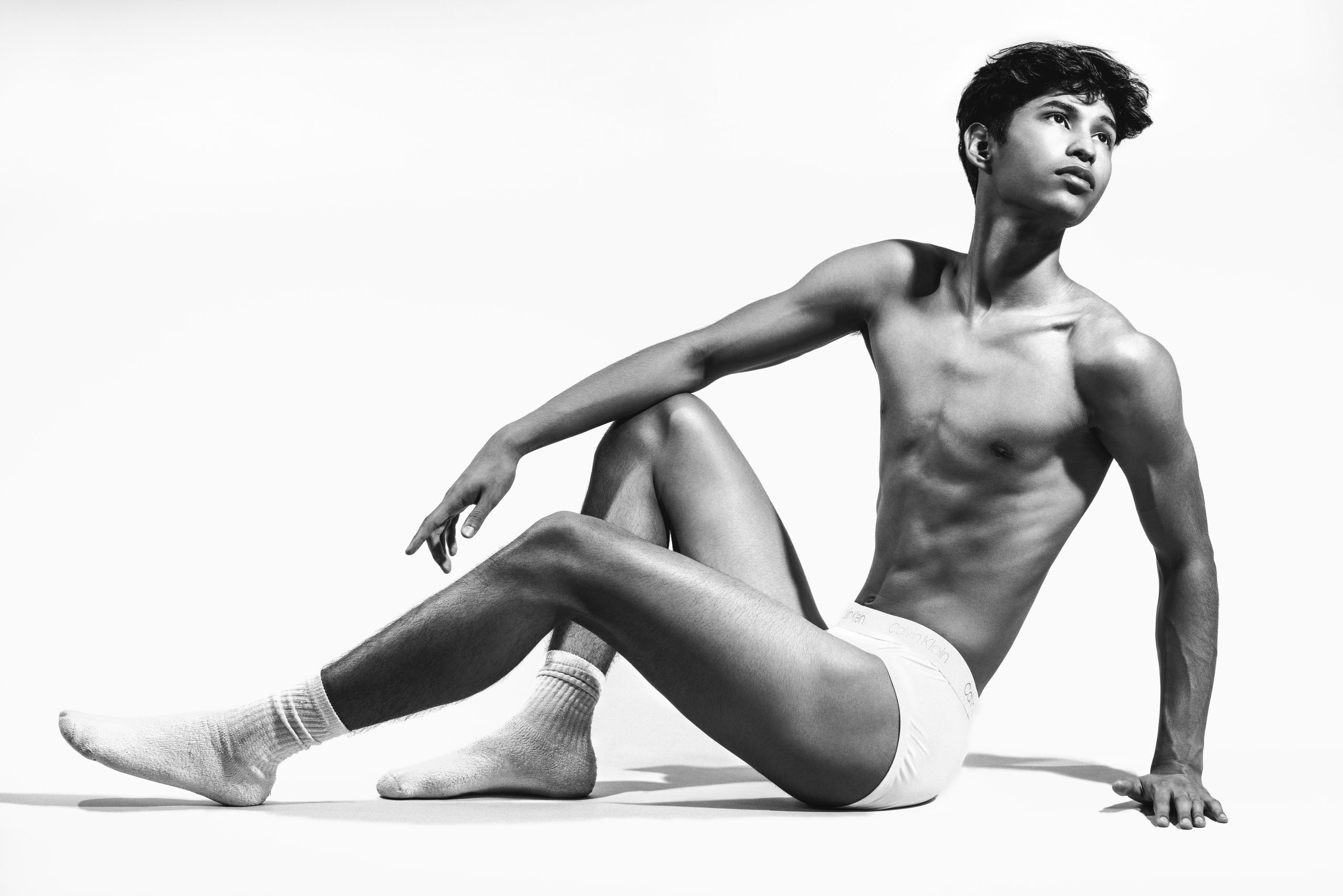Before and after photos of man practicing pilates poses