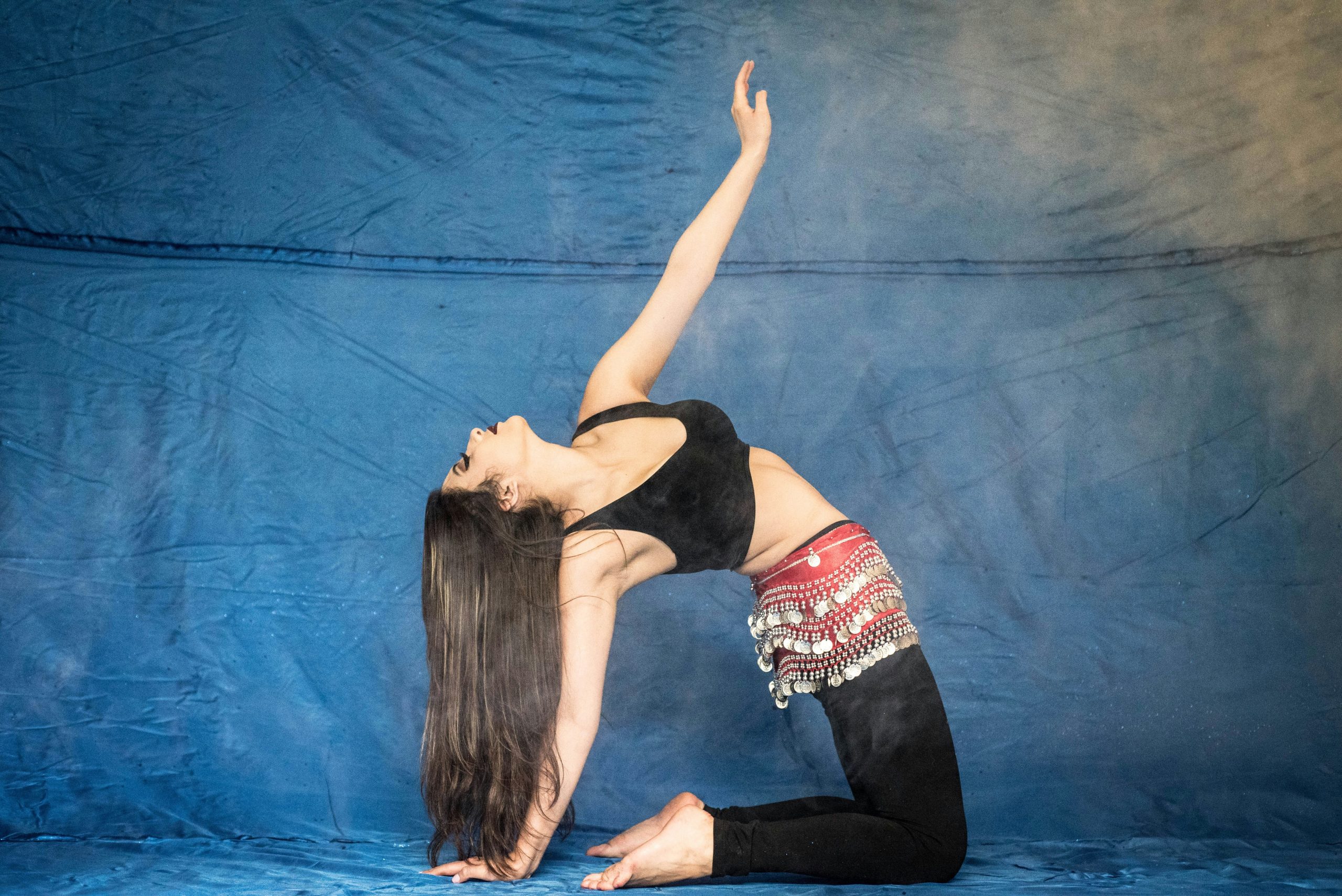 Sarah posing confidently after her Pilates transformation