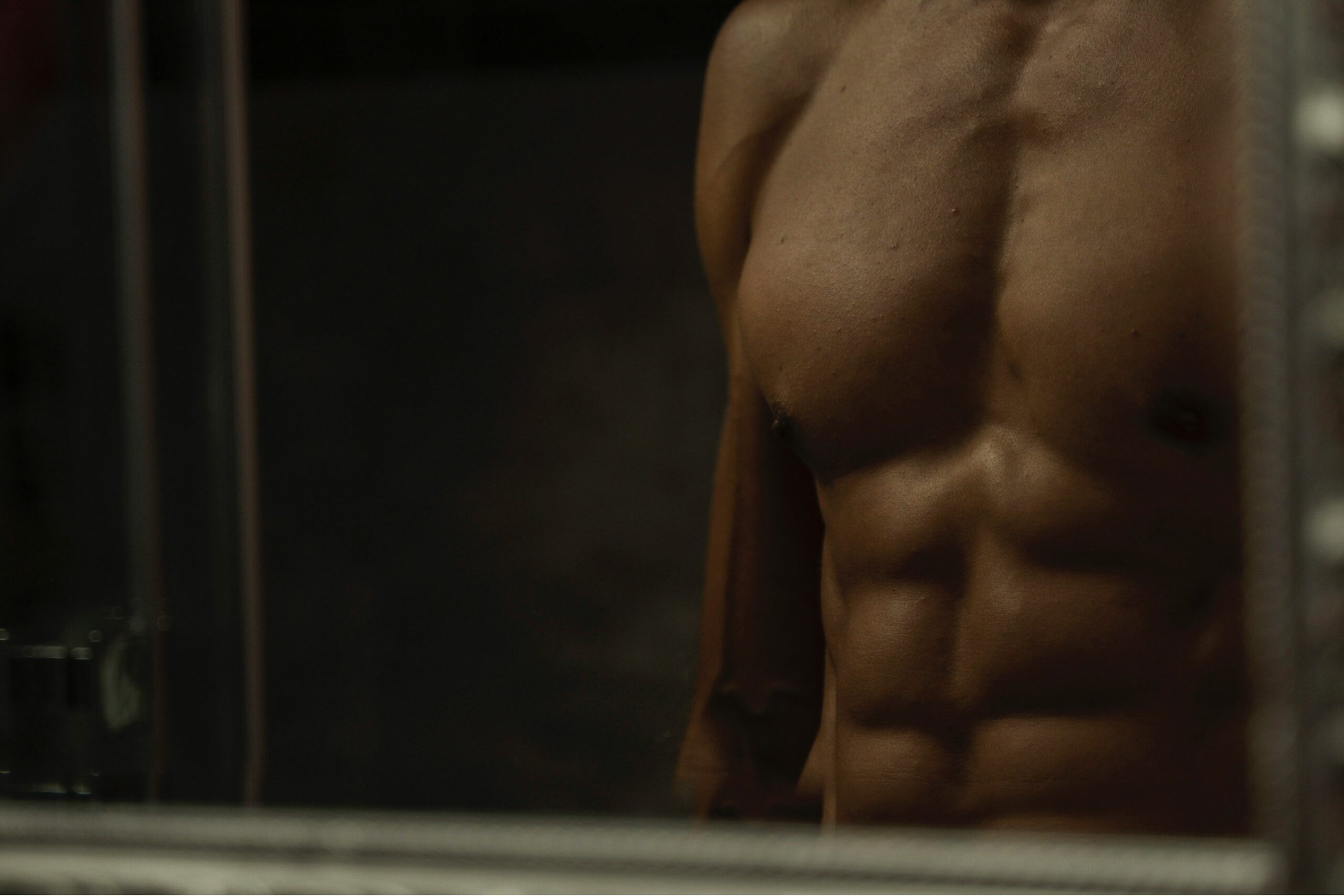 Diagram showing major core muscles including abs, obliques, and lower back.